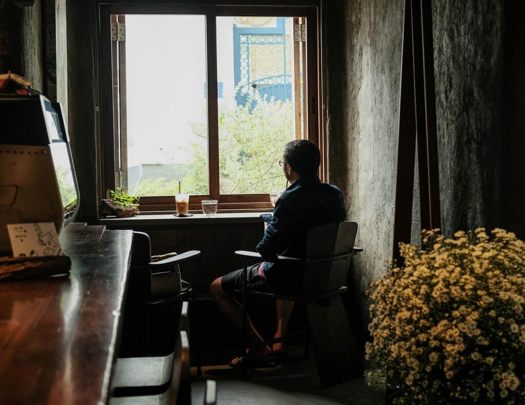 g5d8fb01fe97cc5f8b80a5b957a98b967c736be012f505bd7374391863e156dc10022b09236ac8cd13df7d17e125ea63c2c62fa5bc794fa6d25bdc89daeea593e_1280-6875770 elderly person, looking out the window, home, relaxing, coffee time